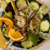 Aguachile Verde · Fresh shrimp, green jalapenos, lemon juice, grain salt, pepper, avocado, cucumber, and red o...