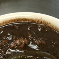 Dinuguan · Served with a scoop of white rice. Special stew made with diced pork, vinegar, and chili pep...