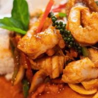 Spicy Jungle · Stir fried Spicy red curry sauce with kaffir lime leave, bell pepper, bamboo shoot, egg plan...