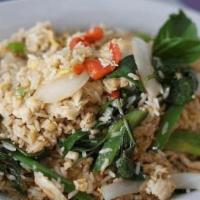 Basil Fried Rice · Stir fried rice with egg, chili-garlic and basil.