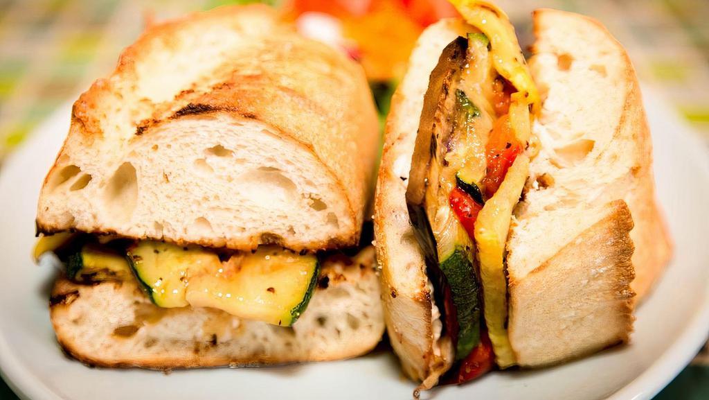 Vegetarian · Goat cheese, eggplant, zucchini, roasted red peppers, yellow squash, red onions, roasted tomatoes and chipotle mayo.