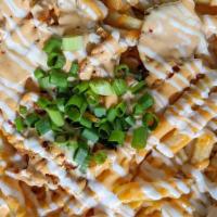 Kimchi Fries · Fries with sautéed kimchi, cheddar cheese, sour cream, and spicy mayo.