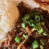Bulgogi · Thinly sliced rib eye marinated in sweet soy sauce. Served with steamed rice and side dishes.
