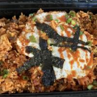 Kimchi Fried Rice · Savory fried rice with kimchi, topped with fried egg. Choice of pork belly, chicken, or tofu.