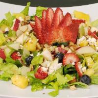 Fruit Salad · Romaine lettuce, chicken, strawberries, pineapple, apple blueberries, feta cheese, nuts, alm...