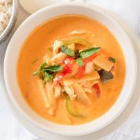 Gang Dang · Red curry with coconut milk, bamboo shoots, bell peppers, zucchini, Thai basil, and kaffir l...