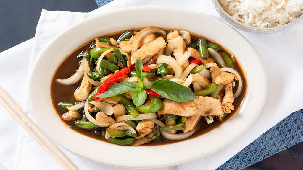 Pad Gra Prow · A famous Thai dish with garlic, Thai spicy chilies, bell peppers, Thai basil, green beans, and onion.