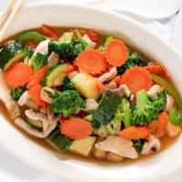 Pad Kee Mao · Medium spicy stir fried with broccoli, bell peppers, mushrooms, carrots, baby corns, Thai sp...