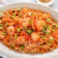 Pad Thai · Rice noodles stir fried with meat, egg, green onion, bean sprouts, fish sauce, vinegar, suga...