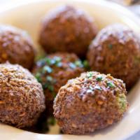 Falafel Plate 6Pc · Six pieces of deep fried falafel mix (garbanzo beans, parsley, cilantro, onion, garlic and s...