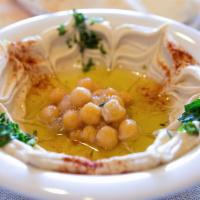 Hummus Plate. · Mashed garbanzo beans, tahini sauce and lemon juice topped with olive oil. Served with fresh...