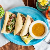 Street Tacos · Three Asada, Pork carnitas, Al Pastor or Pollo Asado served with cilantro, onions and salsa.