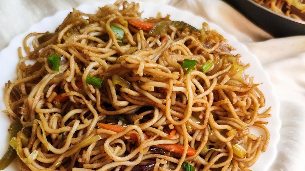 Chow Mein · Sautéed mixed vegetables with a bag of crunchy noodles on the side.