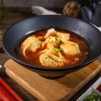 Chicken Veggie Wonton W/ Hot & Sour Sauce (6) 酸辣菜肉大馄饨 · Chicken wontons in our hot and sour sauce will invigorate your taste buds.