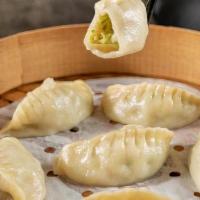 Zucchini Shrimp Dumplings (6) 青瓜鲜虾蒸饺 · Steamed dumplings with refreshing zucchini and shrimp. This combination is a match made in h...