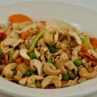 51 Cashew Nut Chicken · Mixed vegetables, water chestnuts and cashew. nuts in a garlic sauce.