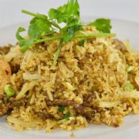 88 Arawan Fried Rice · Curry powder, green onions, egg, tomatoes, and onions.