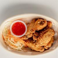 Sweet Rice Chicken Wings · Seasoned chicken wings deep fried.