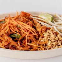 Pad Thai · A traditional thai noodle dish, rice noodles stir-fried in a sweet, tangy sauce with bean sp...
