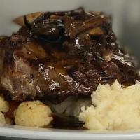 Grilled Ny Steak · with wild mushroom, red wine demi sauce, garlic mashed potatoes, garden vegetables