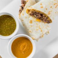 Steak A Break Burrito (Carne Asada) · Grilled sirloin steak topped with sour cream, salsa, cheese, and spanish rice wrapped in a w...