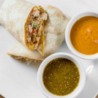 Chick O' Cluck Burrito (Chicken) · Grilled chicken topped with sour cream, salsa, cheese, and spanish rice wrapped in a warm to...