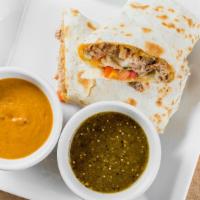 Get Porky! (Carnitas Burrito) · Braised pork shoulder topped with sour cream, salsa, cheese, and spanish rice wrapped in a w...