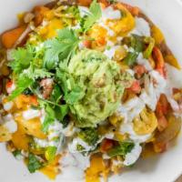 Grilled Veggies Bowl · Grilled seasonal vegetables topped with sour cream, salsa, jalapeno, lettuce, black beans, o...