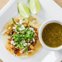 All In For Al Pastor Taco · Thinly sliced boneless shoulder pork topped with sour cream, salsa, chilies, and cilantro se...