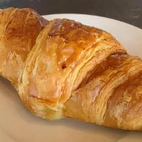 Butter Croissant · Fresh out of the oven, flaky and buttery