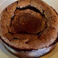 Gateau Au Chocolat · Flourless, rich and dense cake made with dark chocolate.
