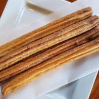 Churro Plate · 4 Churros choose between Strawberry filled, Bavarian Cream Filled, Caramel Filled or Traditi...