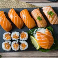 Salmon Lover · 3 pieces of Salmon, 2 pieces of Seared salmon nigiri and 2 pieces of Salmon sashimi with a S...