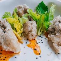 Korean Fried Mushrooms · Maitaki mushrooms, red sriracha vinaigrette, celery leaves, sesame seeds.. *This dish is VEG...