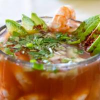 San Diego Cocktail · 4 boiled shrimp, 4 snails, octopus & oysters marinated on lime juice in an array of avocado,...