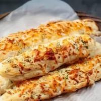 The Great Cheesy Garlic Breadsticks Adventure · Grab your crispy and warm garlic breadsticks!
