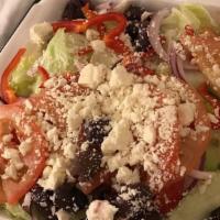 Greek Salad · Imported feta cheese, kalamata olives, mixed with lettuce, tomatoes, onions, bell peppers, a...