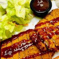 Pork Katsu Cutlet · Deep Fried pork cutlet comes with Katsu Sauce. Served with a side of Steam Rice and side of ...