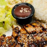 Chicken Teriyaki · Grilled Dark Meat Chicken top with Teriyaki Sauce and Sesame seeds. Comes with macaroni sala...