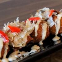 Takoyaki · Appetizer comes with 5 balls made with octopus. Top with Japanese mayo, tonkatsu sauce and t...
