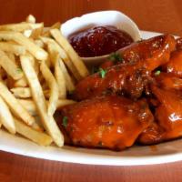 Chicken Wings · 6 chicken wings with our authentic Calabash spices. Served with fries.