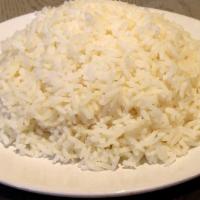 Steamed Jasmine Rice · Side of steamed jasmine rice.