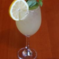 Ginger Pineapple Juice · A zesty refreshing west African juice made with ginger, pineapple, and mint.