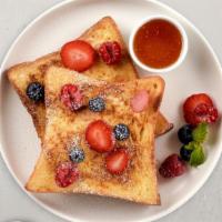 Mixed Berry French Toast · Fresh bread battered in egg, milk, and cinnamon cooked until spongy and golden brown. Topped...