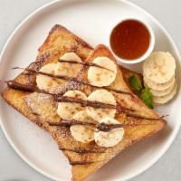 Nutella Banana French Toast · Fresh bread battered in egg, milk, and cinnamon cooked until spongy and golden brown. Topped...