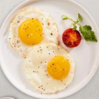 Two Eggs · Get a pair of lightly fried eggs!