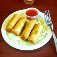 Veg Spring Rolls · Tasty and a crispy snack recipe made with mixed vegetable stuffing wrapped in thin  roll she...