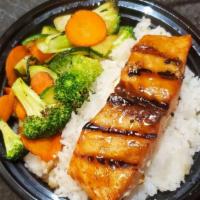Salmon Teriyaki Bowl · Tender and juicy Salmon Cooked on charbroiled Grill with teriyaki sauce served with your fav...