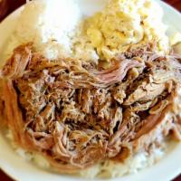 Kalua Pig · Kalua pork is a smoked shredded meat. It is the main dish served at traditional Hawaiian lua...