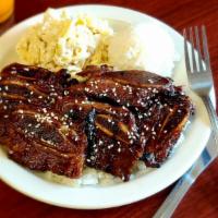 Teriyaki Beef · Every piece of beef is a little crispy and coated in a sweet and
sticky teriyaki sauce. Serv...